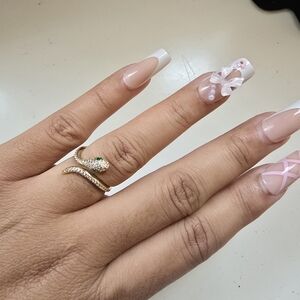 Gold Snake Ring with Green Gemstone Eyes